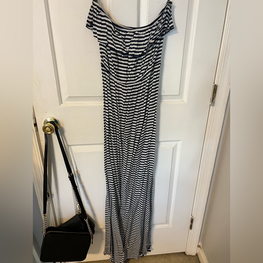 I am selling a Trixxi (brand) striped blue and white maxi dress in size Medium.
